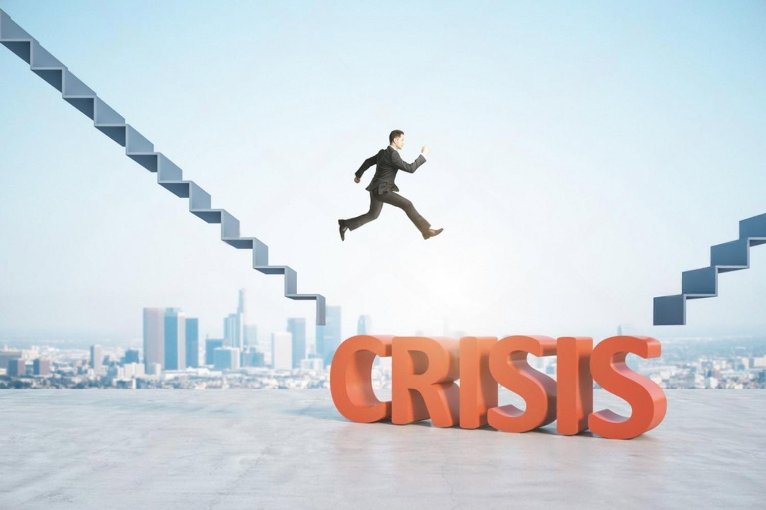 Businessman jumping over a gap above the word crisis, symbolising avoided third-party risk